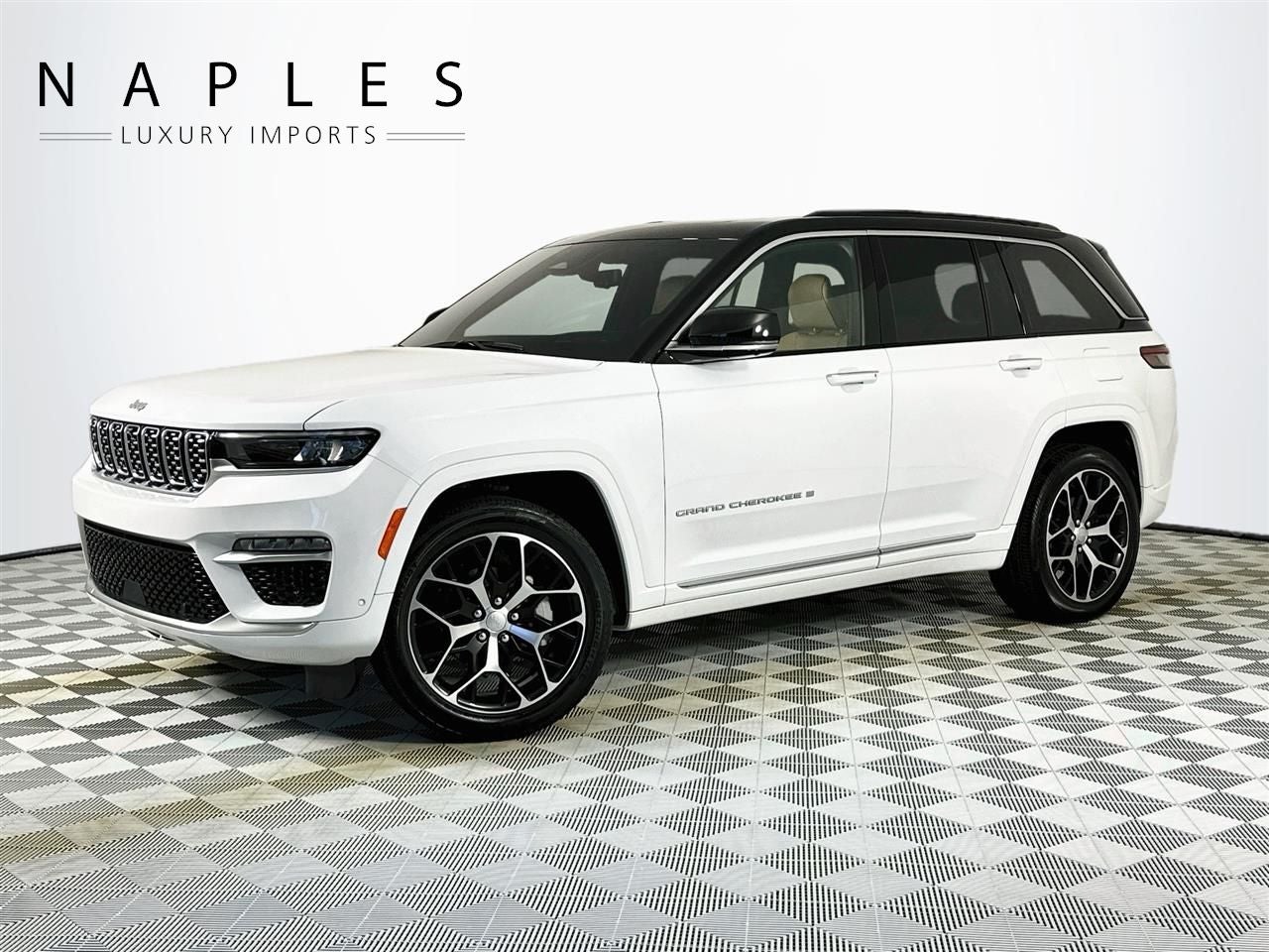 2025 Jeep Grand Cherokee Summit Reserve in Bright White Clearcoat — front three-quarter view
