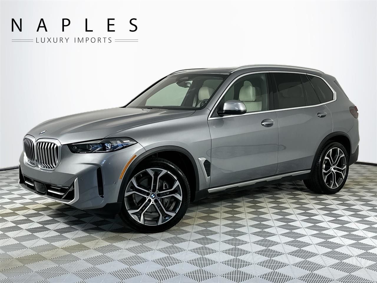 2025 BMW X5 sDrive40i in Gray Metallic — front three-quarter view