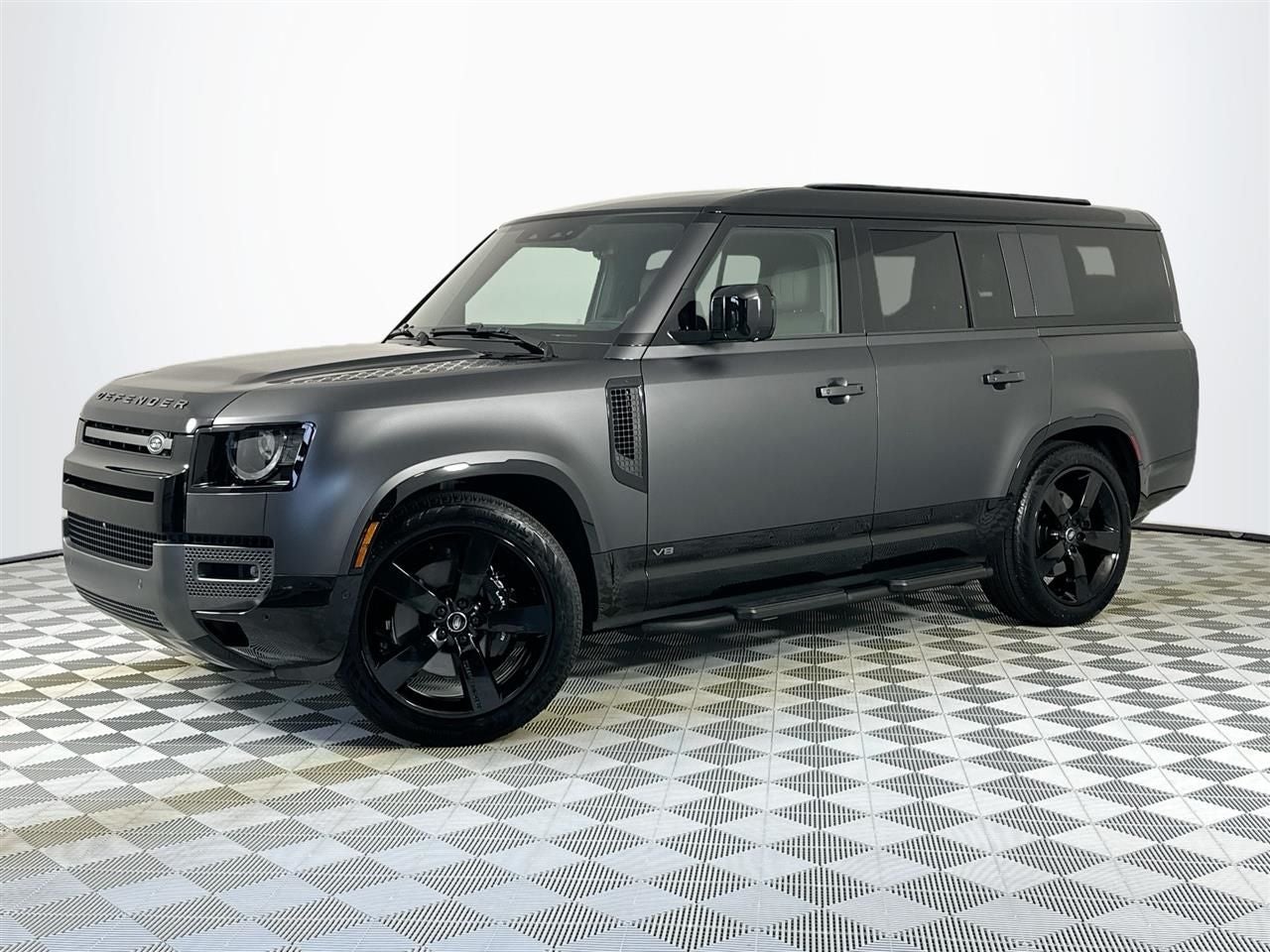 2025 Land Rover Defender 130 V8 in Carpathian Gray Premium Metallic — front three-quarter view