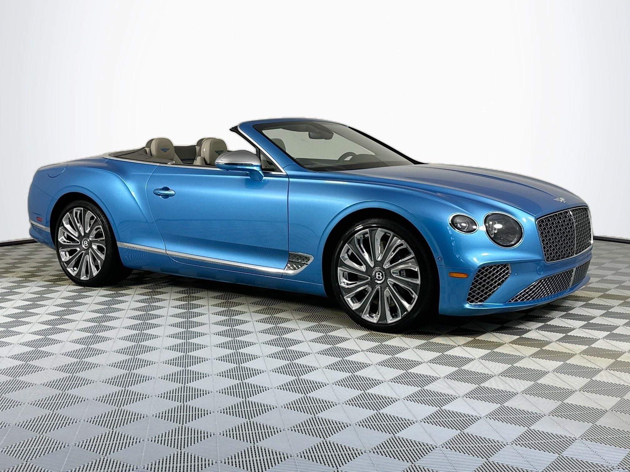 2021 Bentley Continental GTC Mulliner V8 in Kingfisher — front three-quarter view