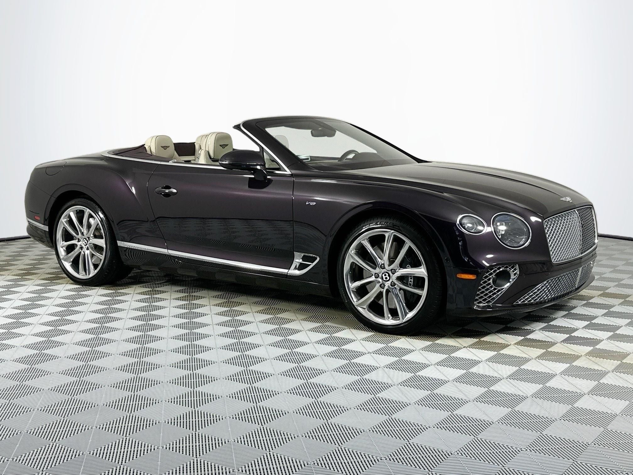 2022 Bentley Continental GTC V8 MDS in Damson Metallic — front three-quarter view