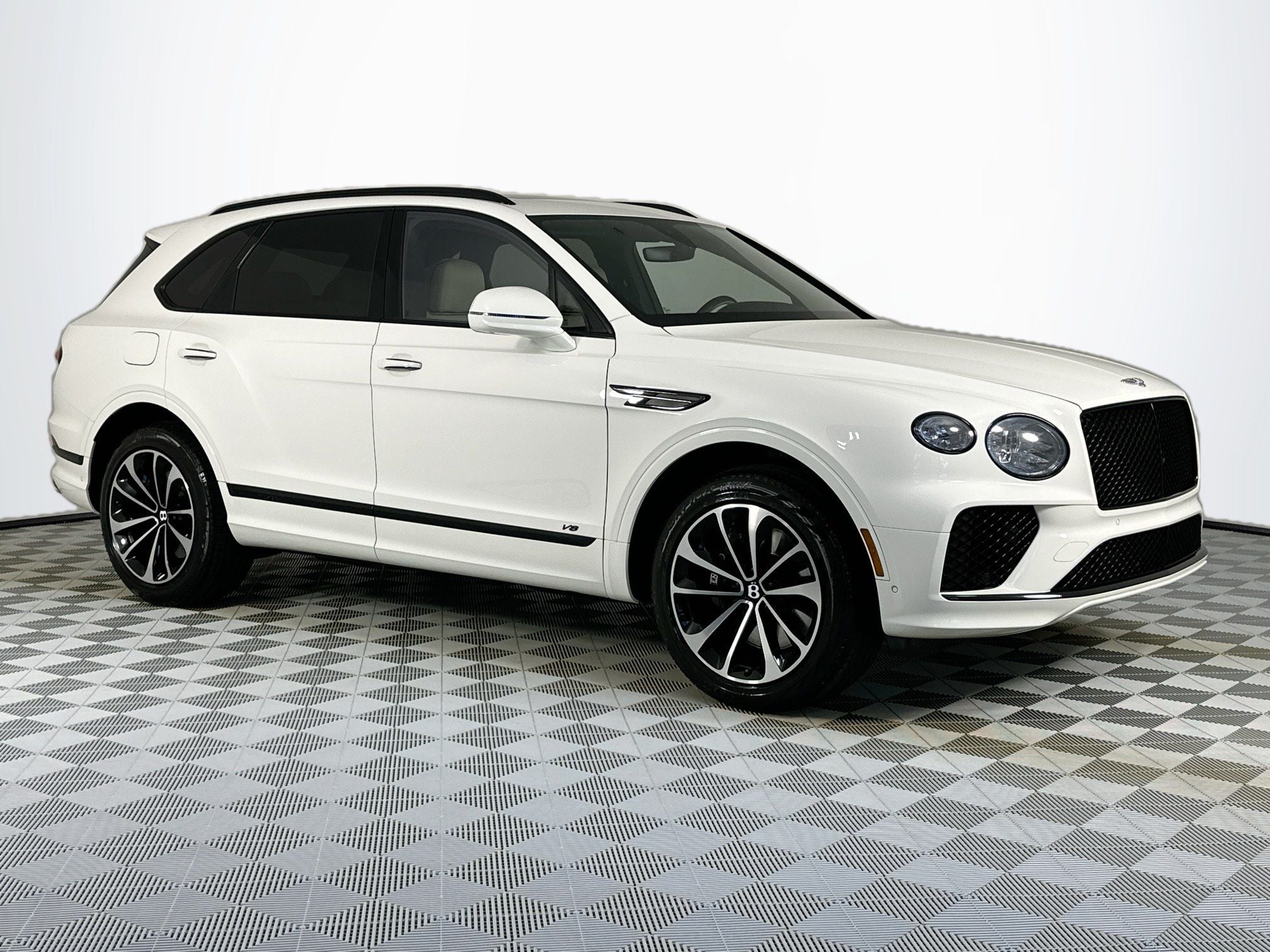 2022 Bentley Bentayga V8 MDS in Pale Brodgar Metallic — front three-quarter view